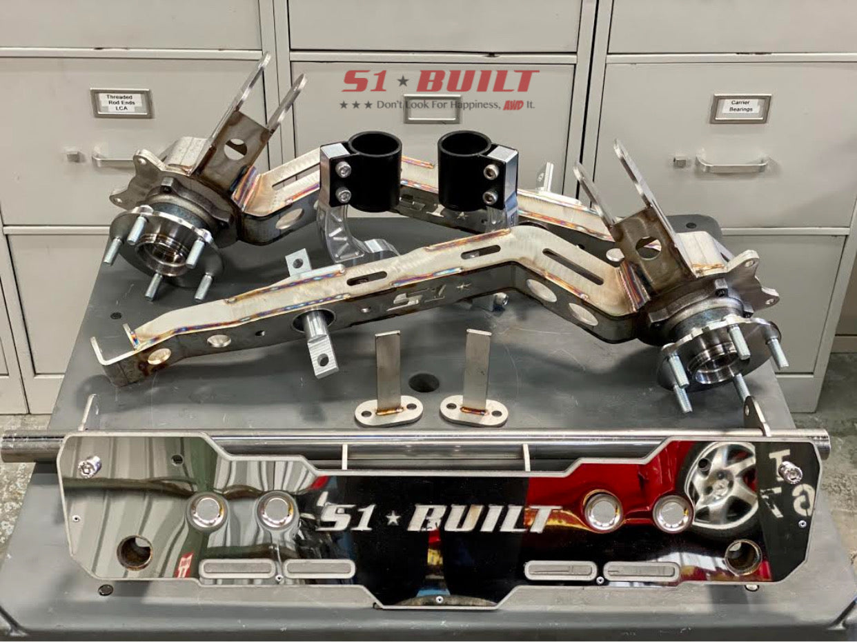 AWD Conversion Bundle: Alpha6 AWD/RWD/FWD Rear Trailing Arms with Delta7 Rear Diff Mount Kit and Billet Forks